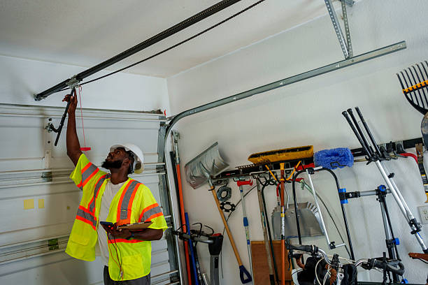 Professional Garage Door Panel Replacement technician working in Anoka County County, MN